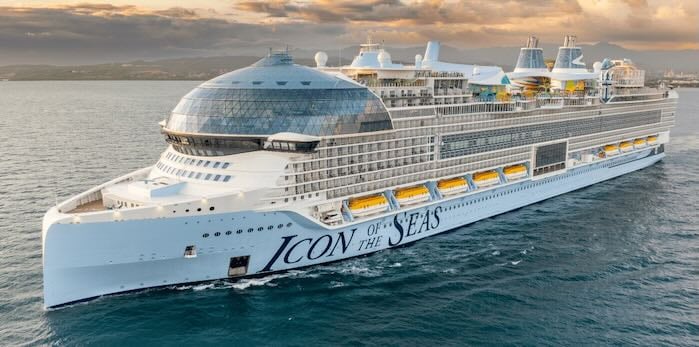 Icon of the Seas in the Ocean at sunset