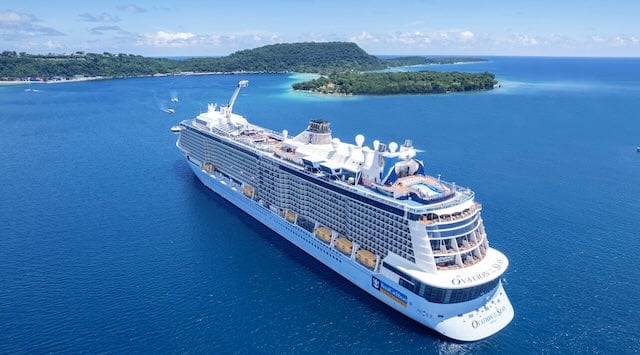 Ovation of the Seas at island Ovation of the seas next to a really nice looking island