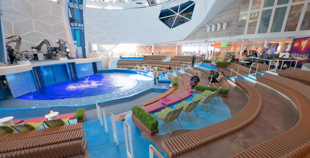 star of the Seas cabin to avoid - AquaDome area with multilevel glass dome pools and surrounding deck seating