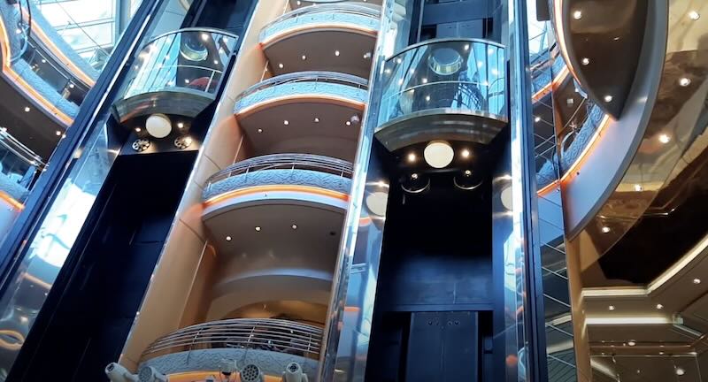 Modern elevators in stylish lobby design. - Near Elevators and High-Traffic Lobbies
