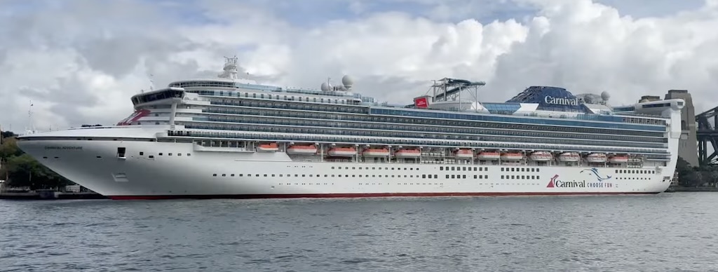 Aerial drone view of Carnival Cruise Lines Carnival Adventure docked at port