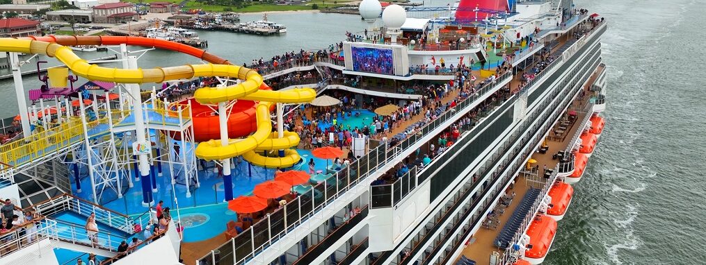 Carnival Breeze—Rooftop view of pool-side theater and water slides area