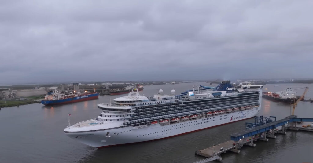 Aerial drone view of a vibrant carnival encounter taking place at sea