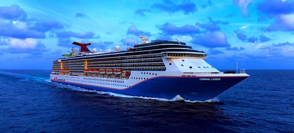 Aerial drone view of Carnival Legend cruising at sea