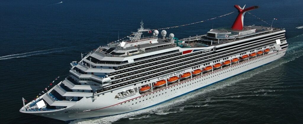 Aerial drone view of Carnival Liberty cruising at sea