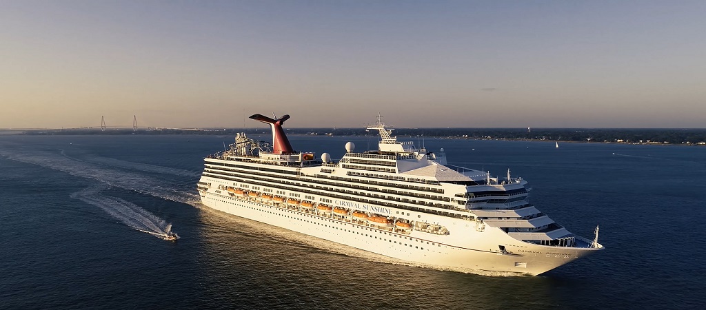Aerial drone view of Carnival Sunshine cruising at sea