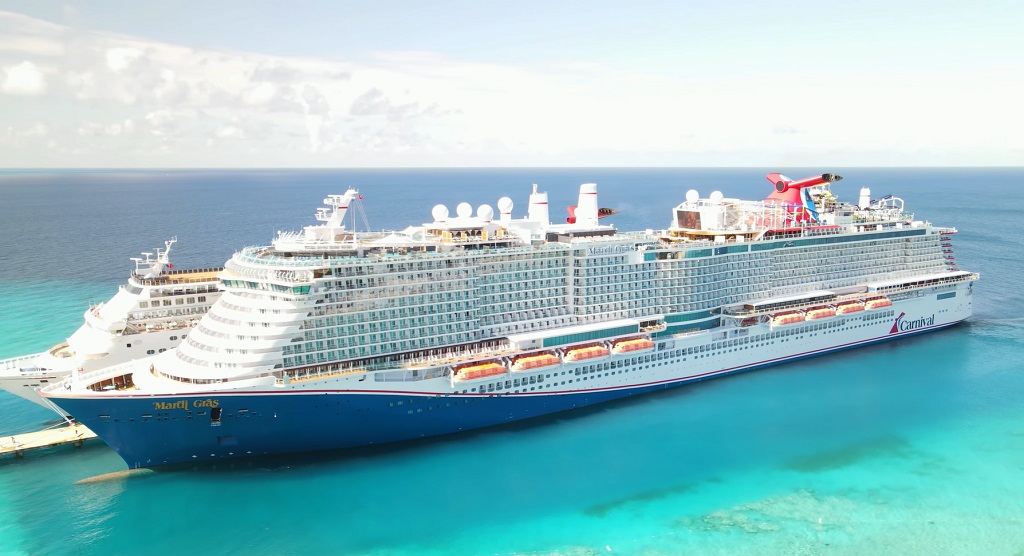 Aerial drone view of a vibrant Mardi Gras celebration at sea