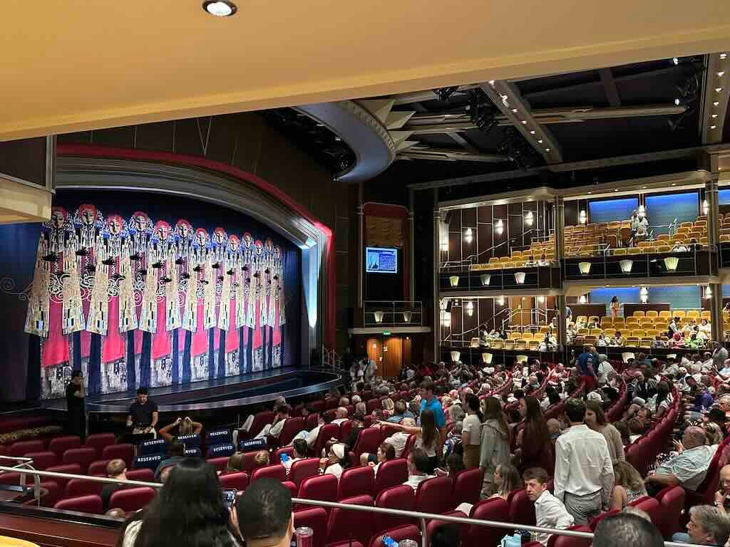 Theater on Freedom of the Seas people getting ready to watch a show