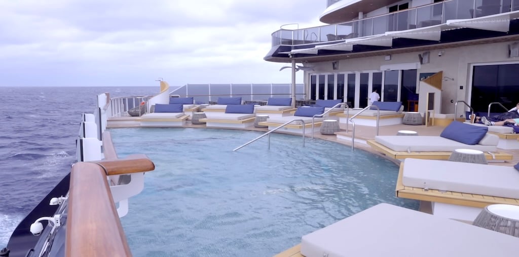 Explora Journeys infinity pool and lounge deck overlooking the ocean