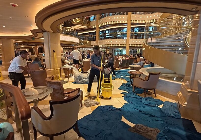 Enchanted Princess Water leak Incident Santorini staff managing the water