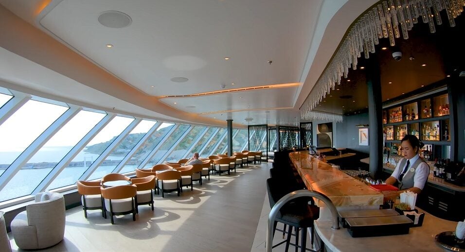 Norwegian vs virgin voyages - Norwegian Prima sitting area or drink bar