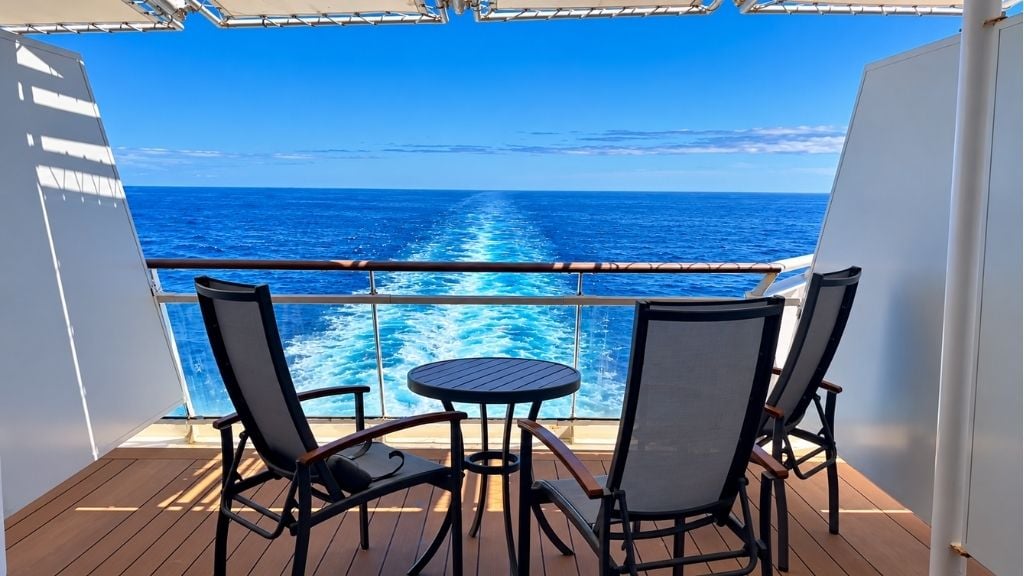 Aft cruise cabin ocean view from balcony